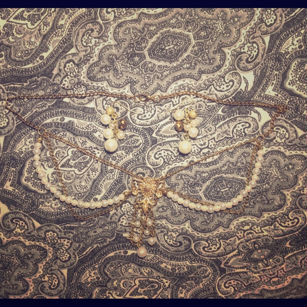 Headpiece with matching earrings.